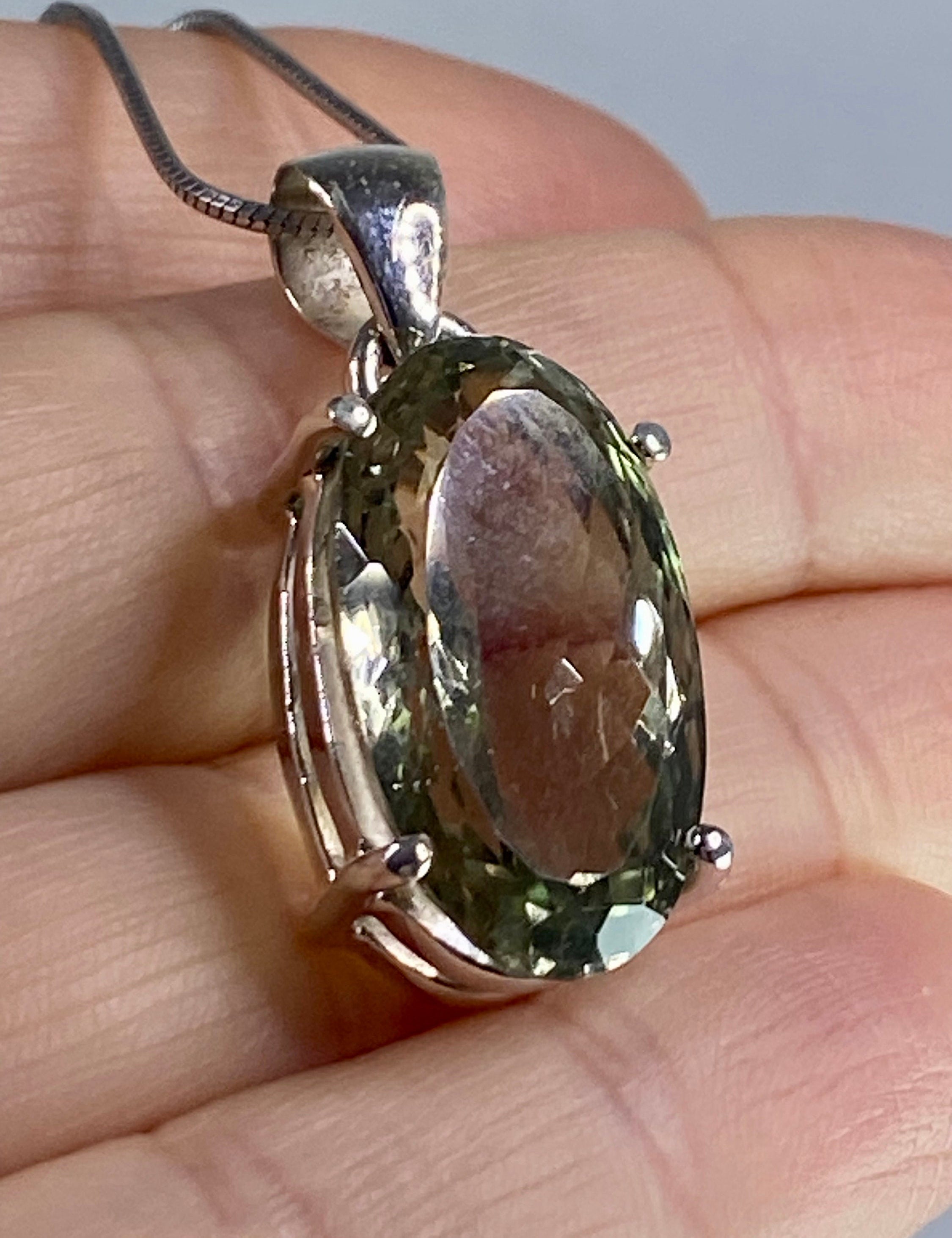 A Large Green Amethyst (Prasiolite ) and Silver Pendant Including the Chain