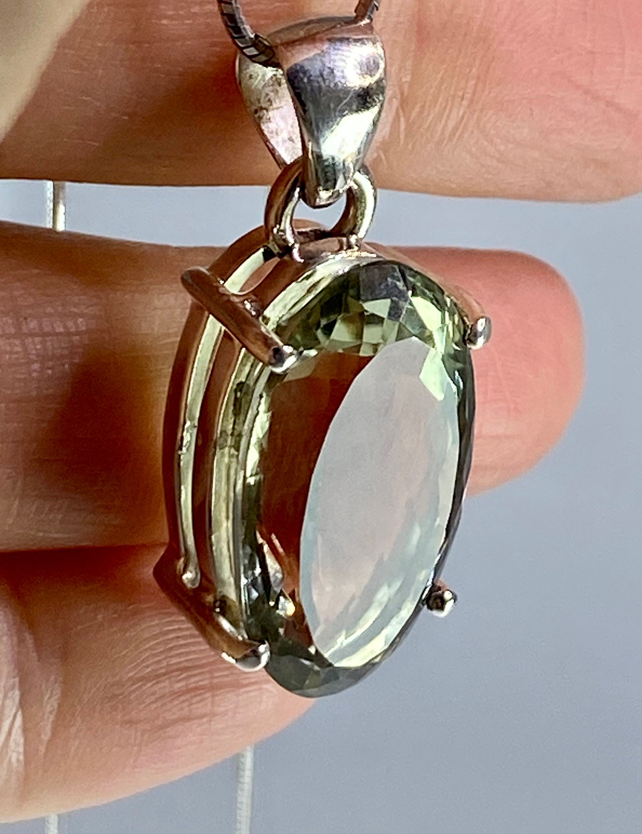 A Large Green Amethyst (Prasiolite ) and Silver Pendant Including the Chain