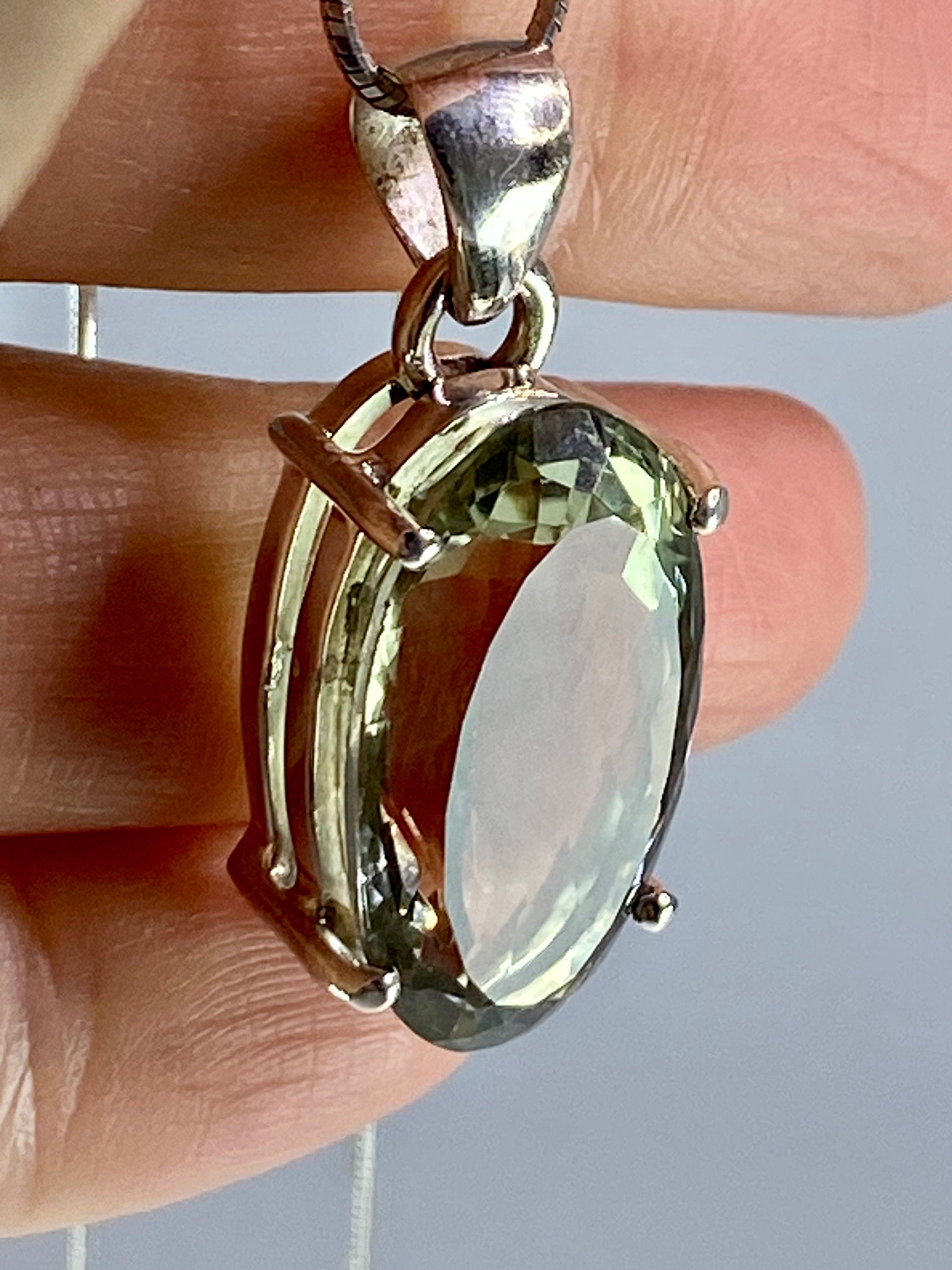 A Large Green Amethyst (Prasiolite ) and Silver Pendant Including the Chain