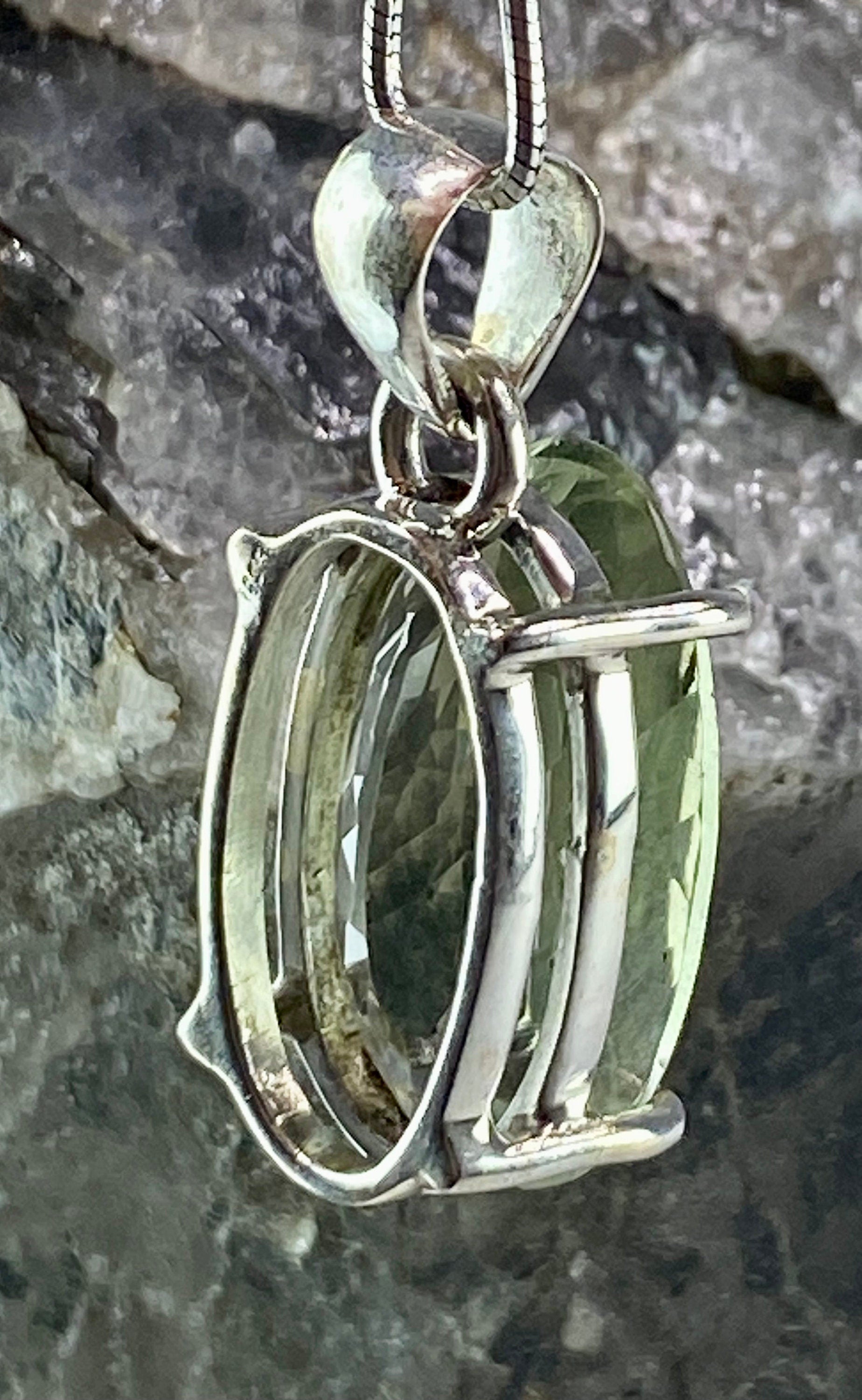 A Large Green Amethyst (Prasiolite ) and Silver Pendant Including the Chain