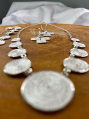 An Original Fine Silver Disk Spiral Necklace, Earrings, Bracelet