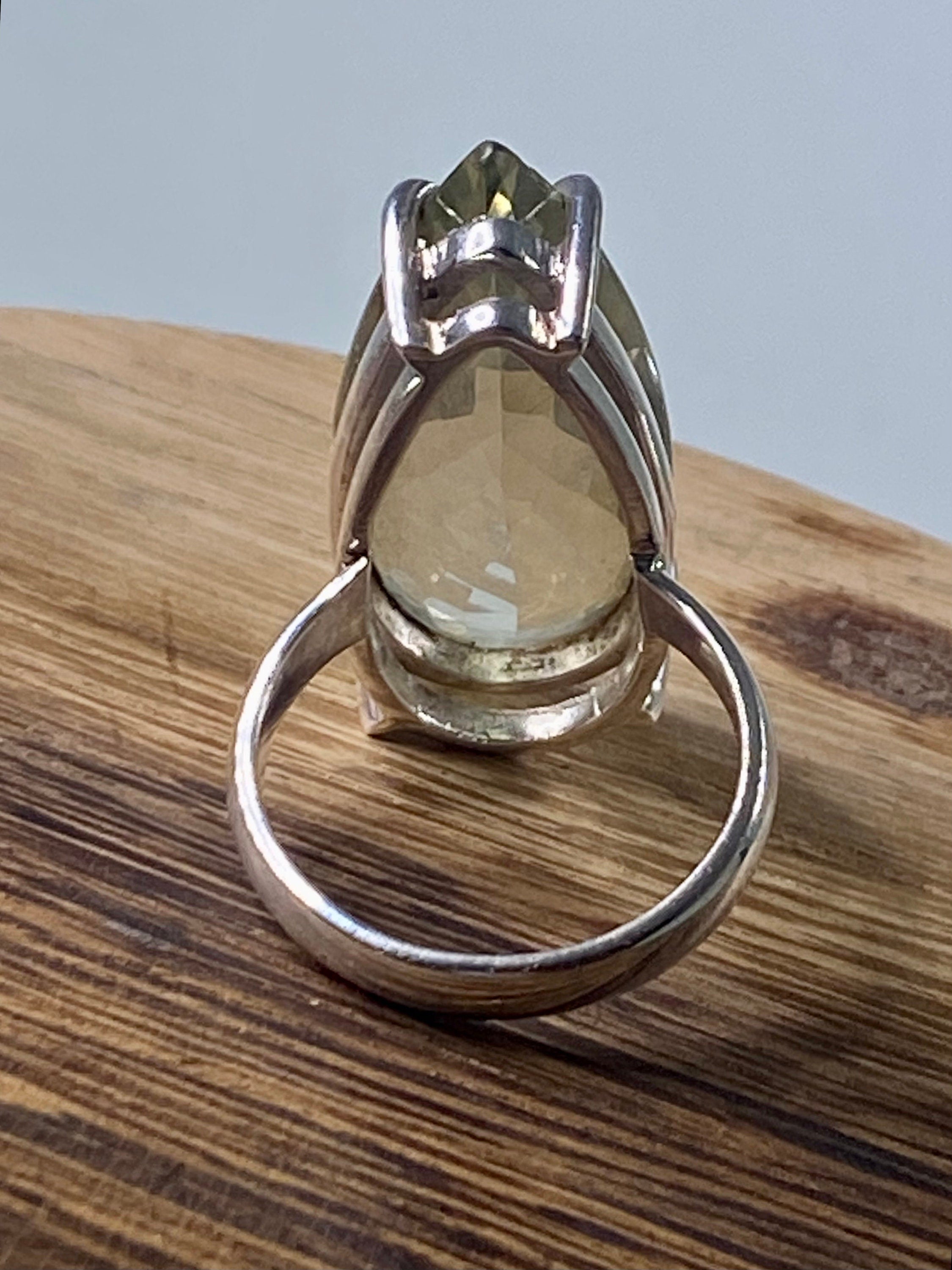 A Large Green Amethyst (Prasiolite ) and Silver Ring