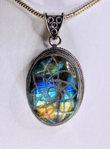 Carved Labradorite and Sterling Silver Pendant Including the Snake Chain