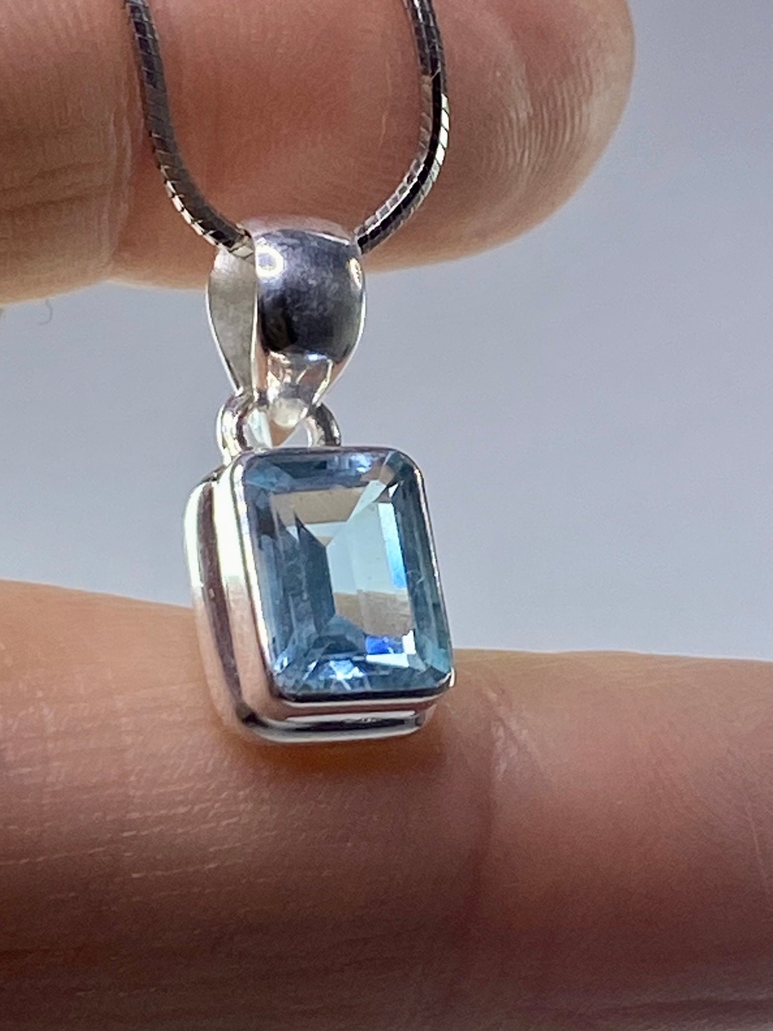 Blue Topaz and Silver Pendant