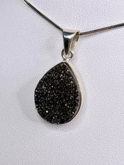 A Beautifully Sparkling Black Druzy Agate and Silver Pendant