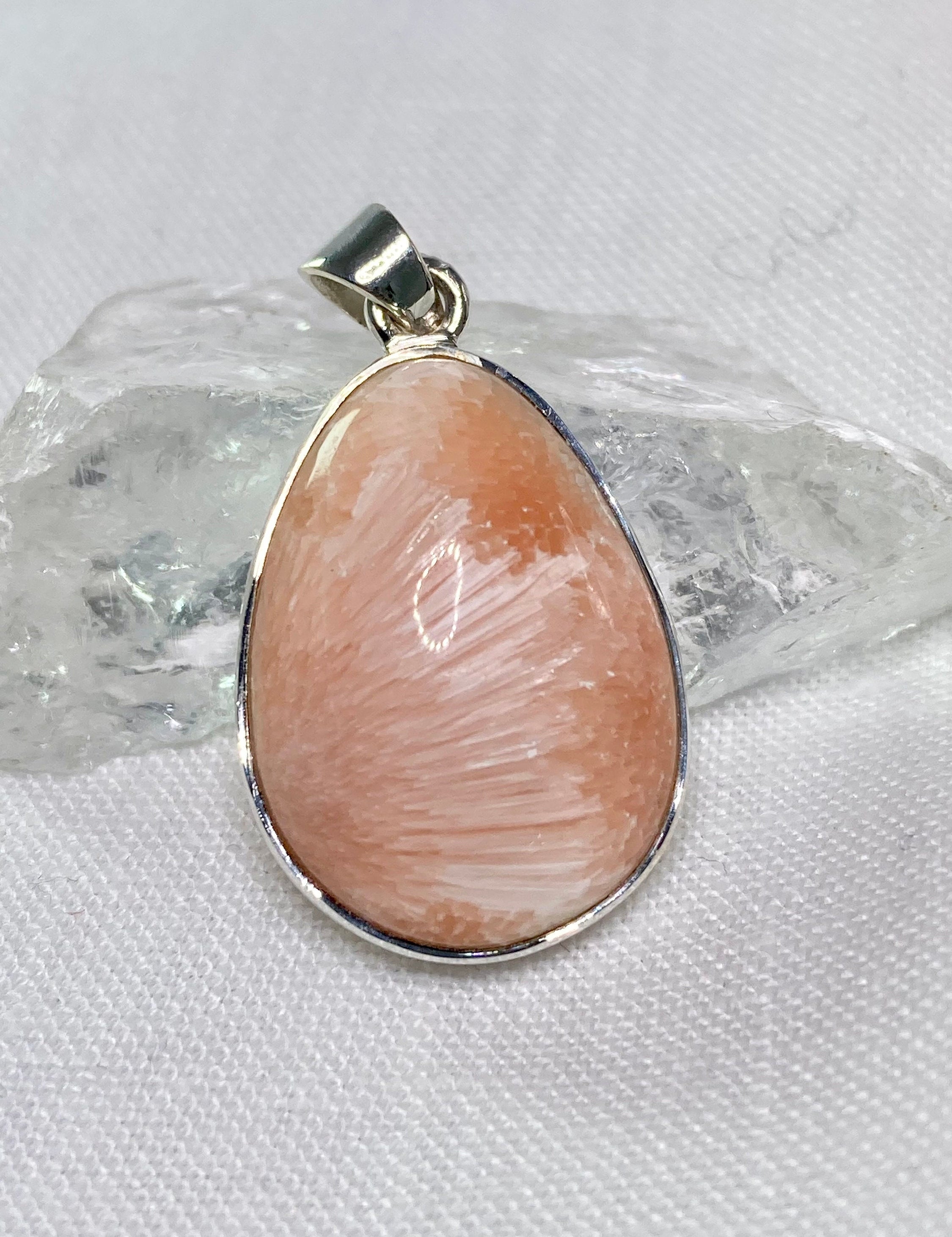 A High Grade Peach Scolecite and Silver Pendant.