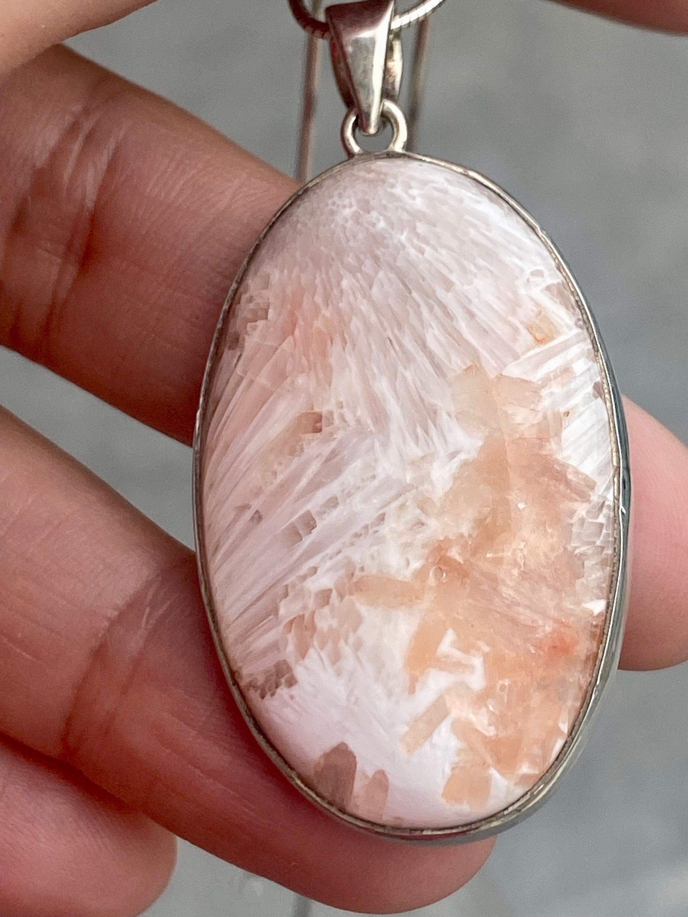 A High Grade Peach Scolecite and Silver Pendant.