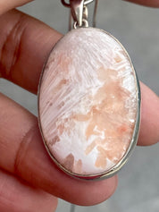 A High Grade Peach Scolecite and Silver Pendant.