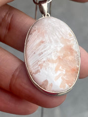 A High Grade Peach Scolecite and Silver Pendant.