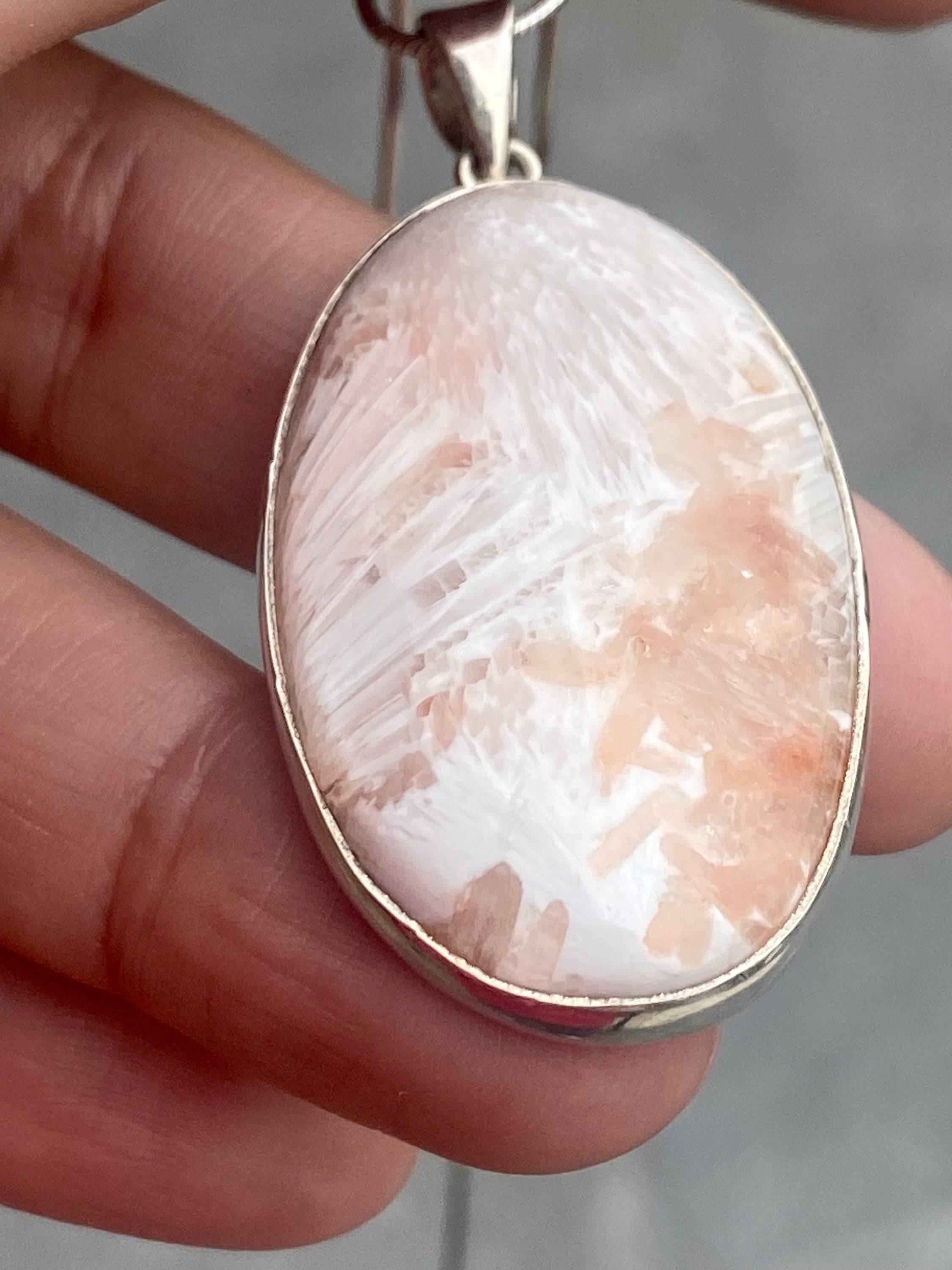 A High Grade Peach Scolecite and Silver Pendant.