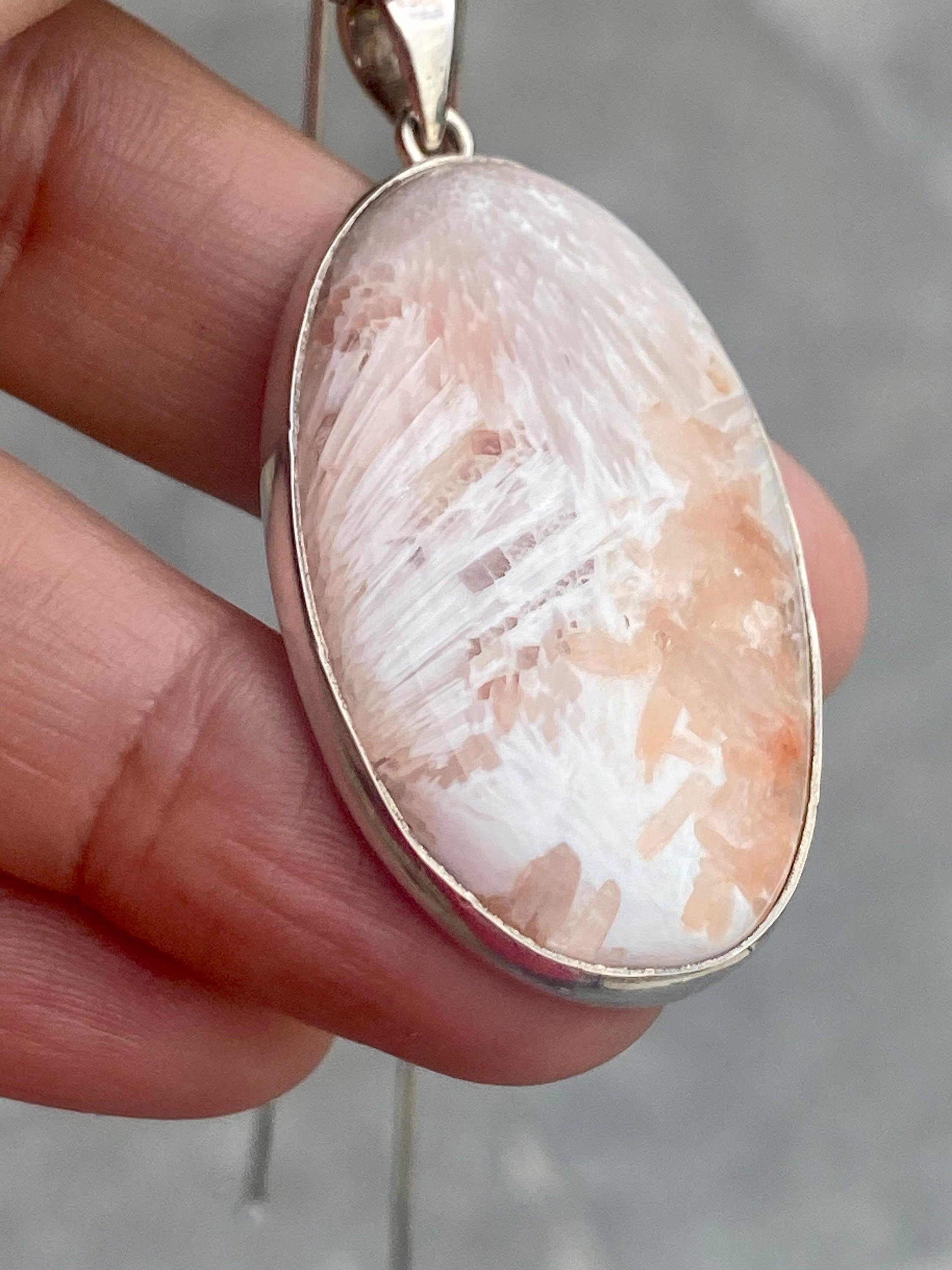 A High Grade Peach Scolecite and Silver Pendant.