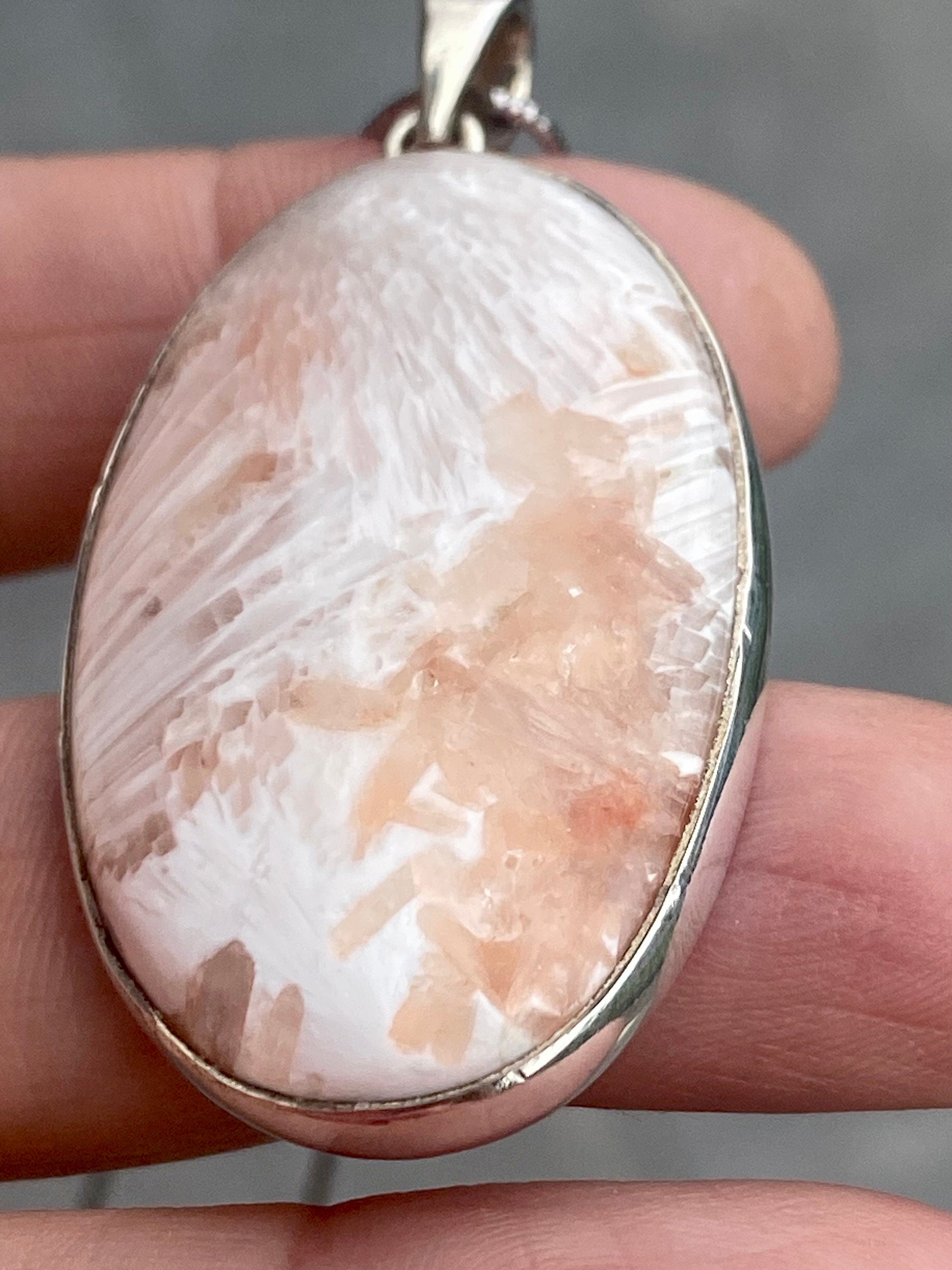 A High Grade Peach Scolecite and Silver Pendant.