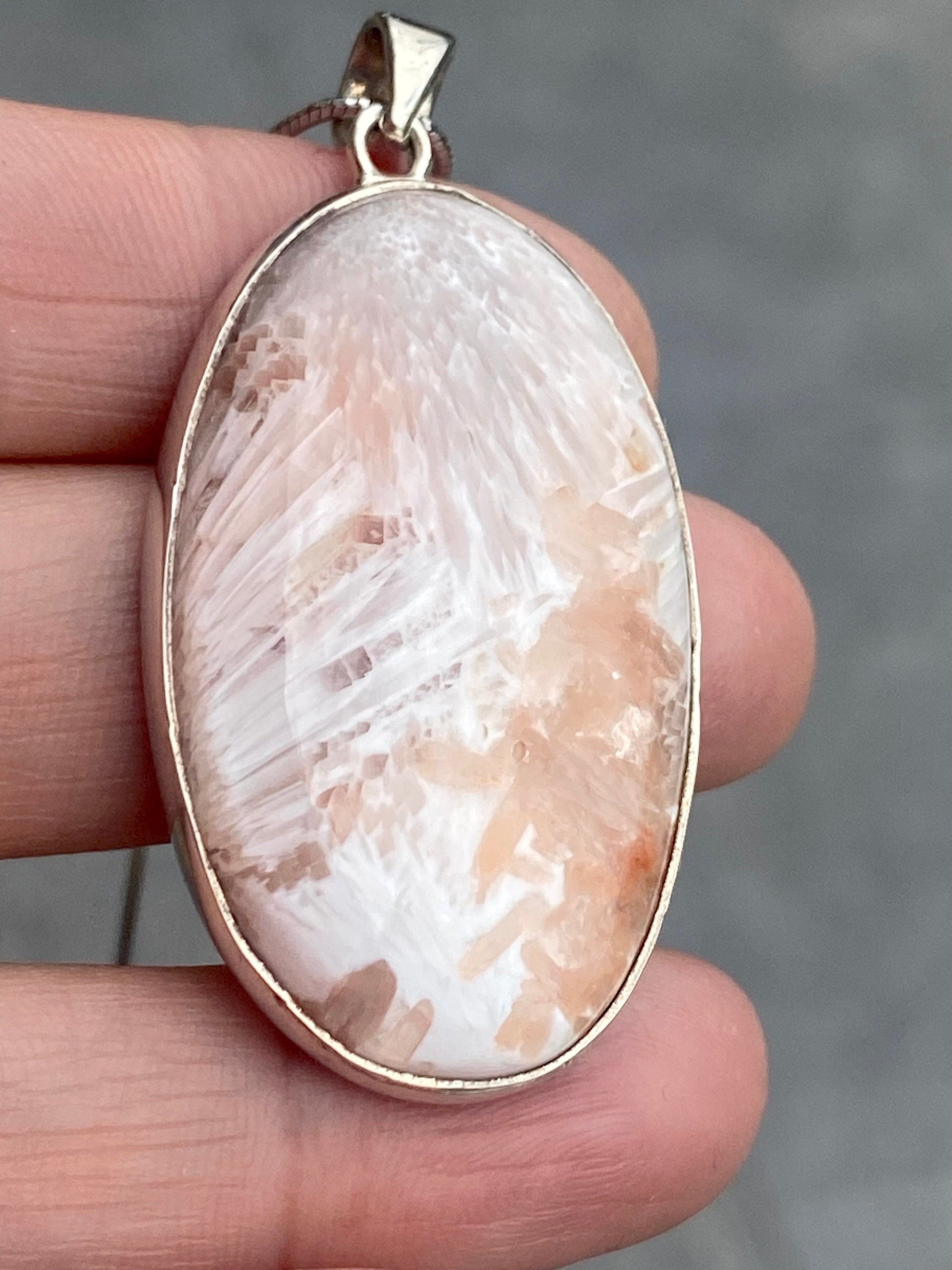 A High Grade Peach Scolecite and Silver Pendant.