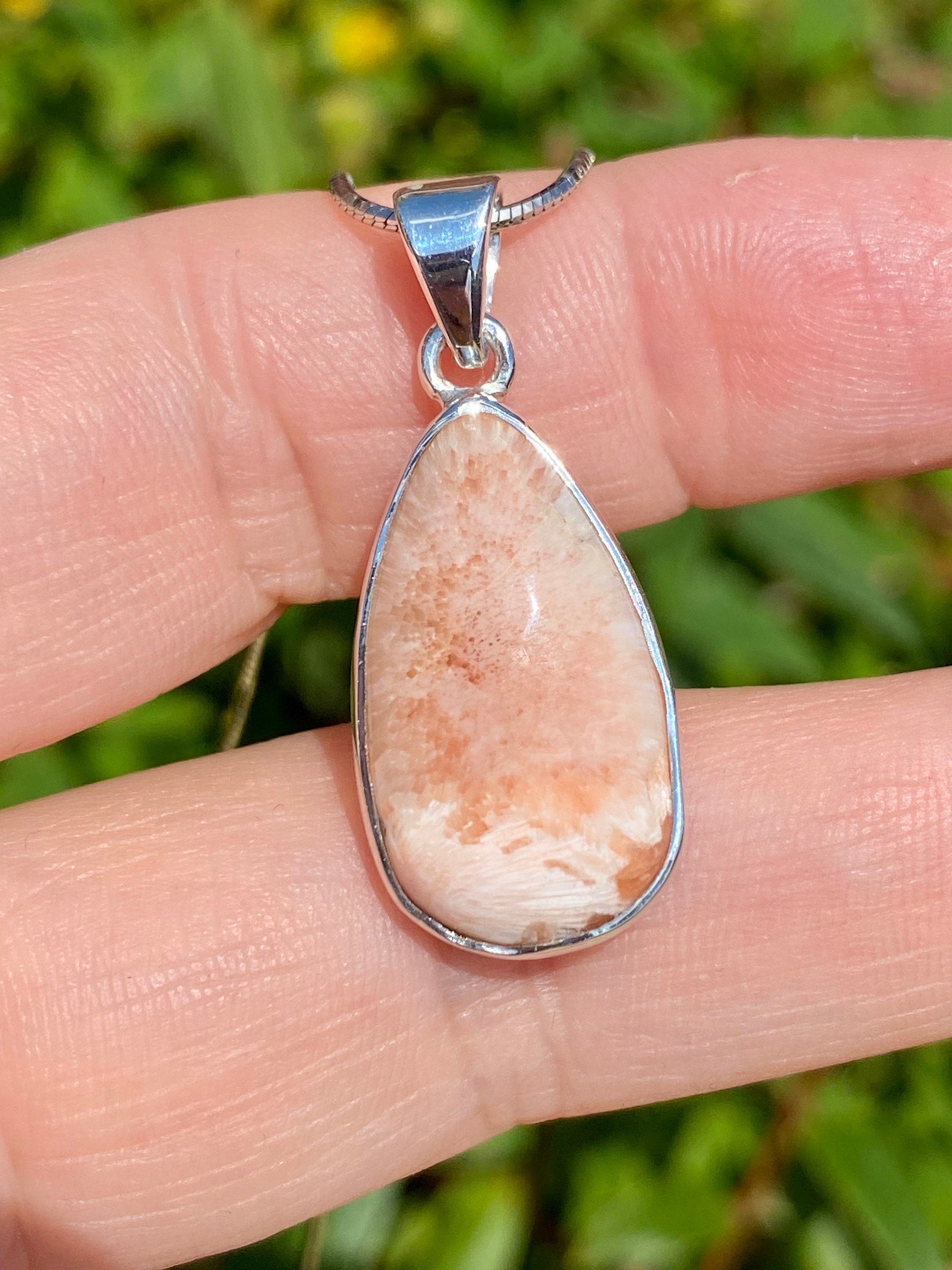 A High Grade Peach Scolecite and Silver Pendant.