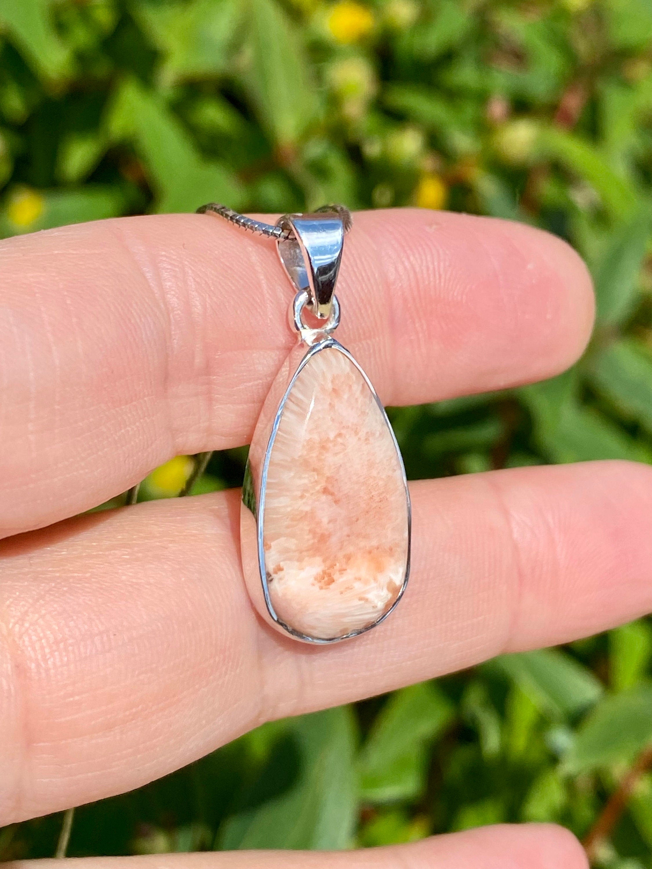 A High Grade Peach Scolecite and Silver Pendant.