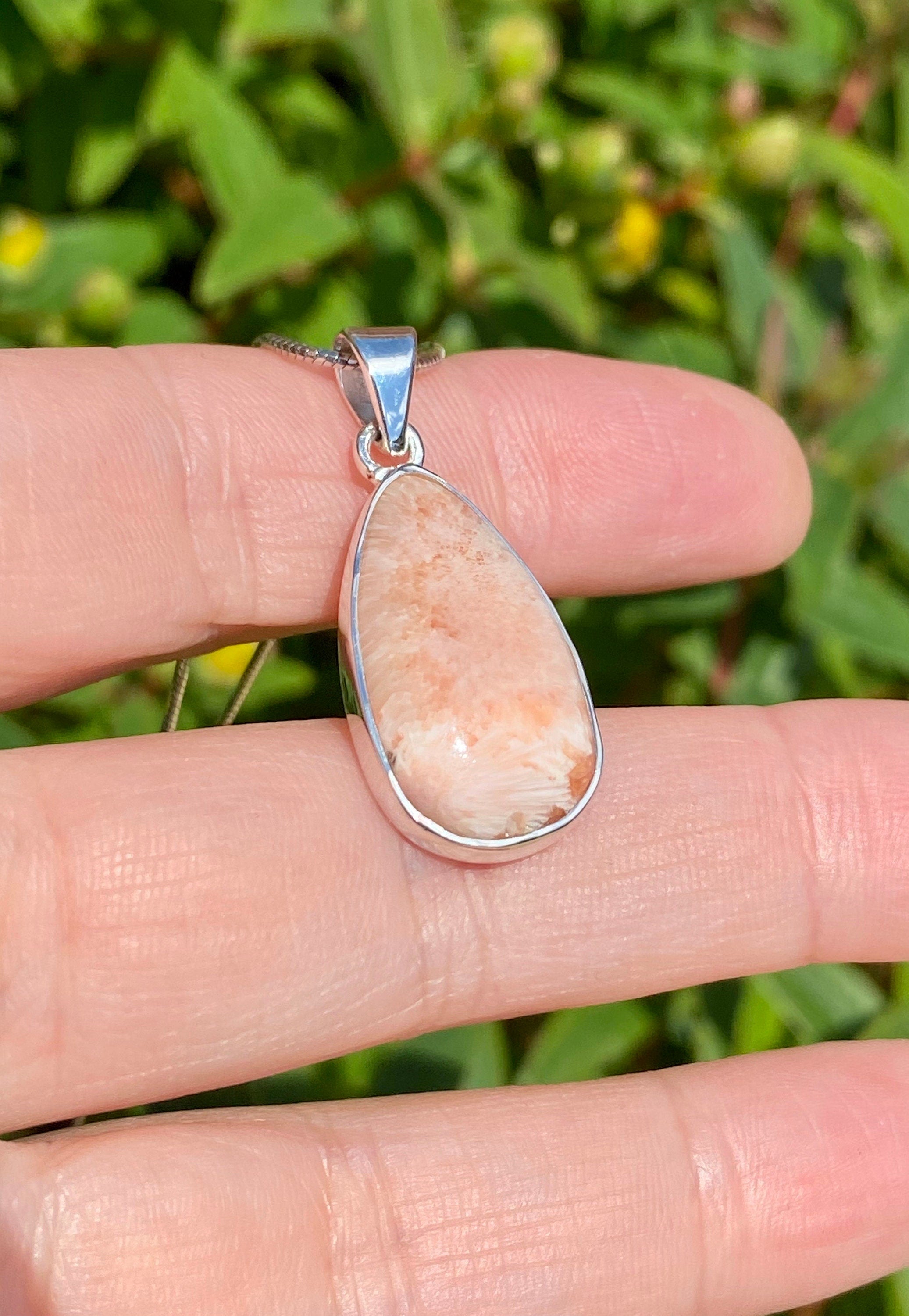 A High Grade Peach Scolecite and Silver Pendant.