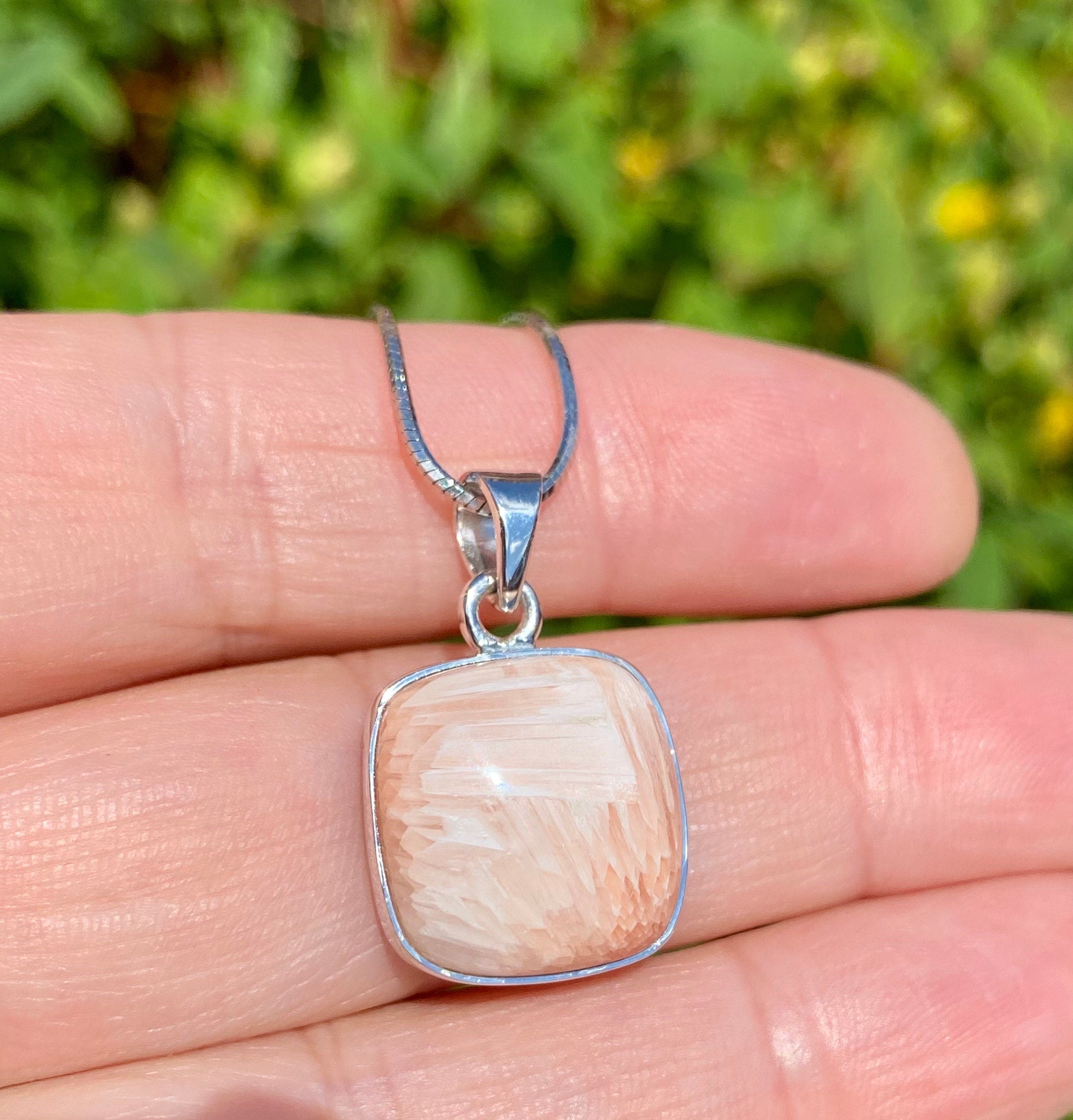 A High Grade Peach Scolecite and Silver Pendant.