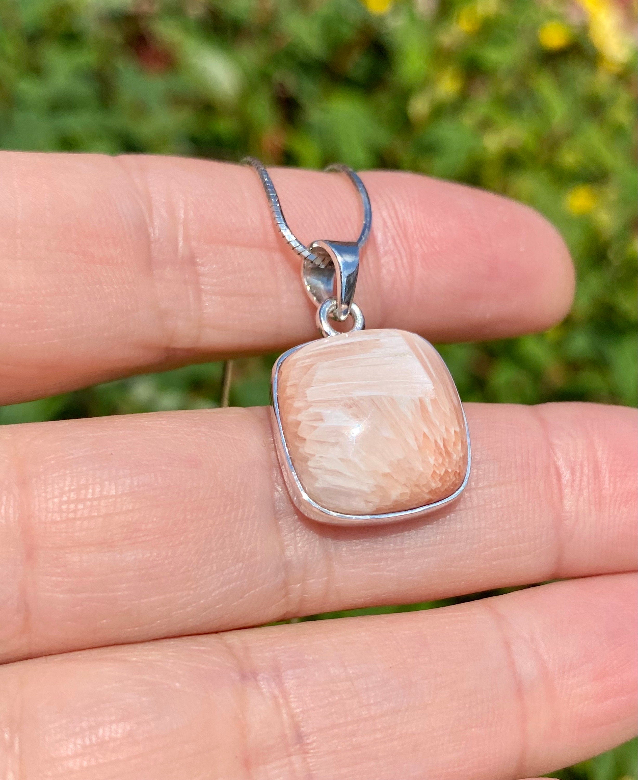 A High Grade Peach Scolecite and Silver Pendant.