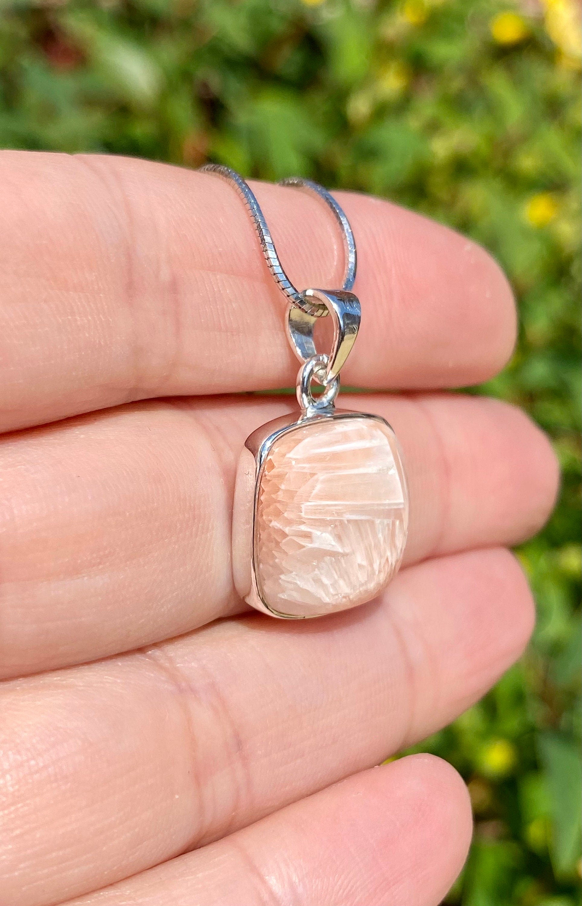 A High Grade Peach Scolecite and Silver Pendant.