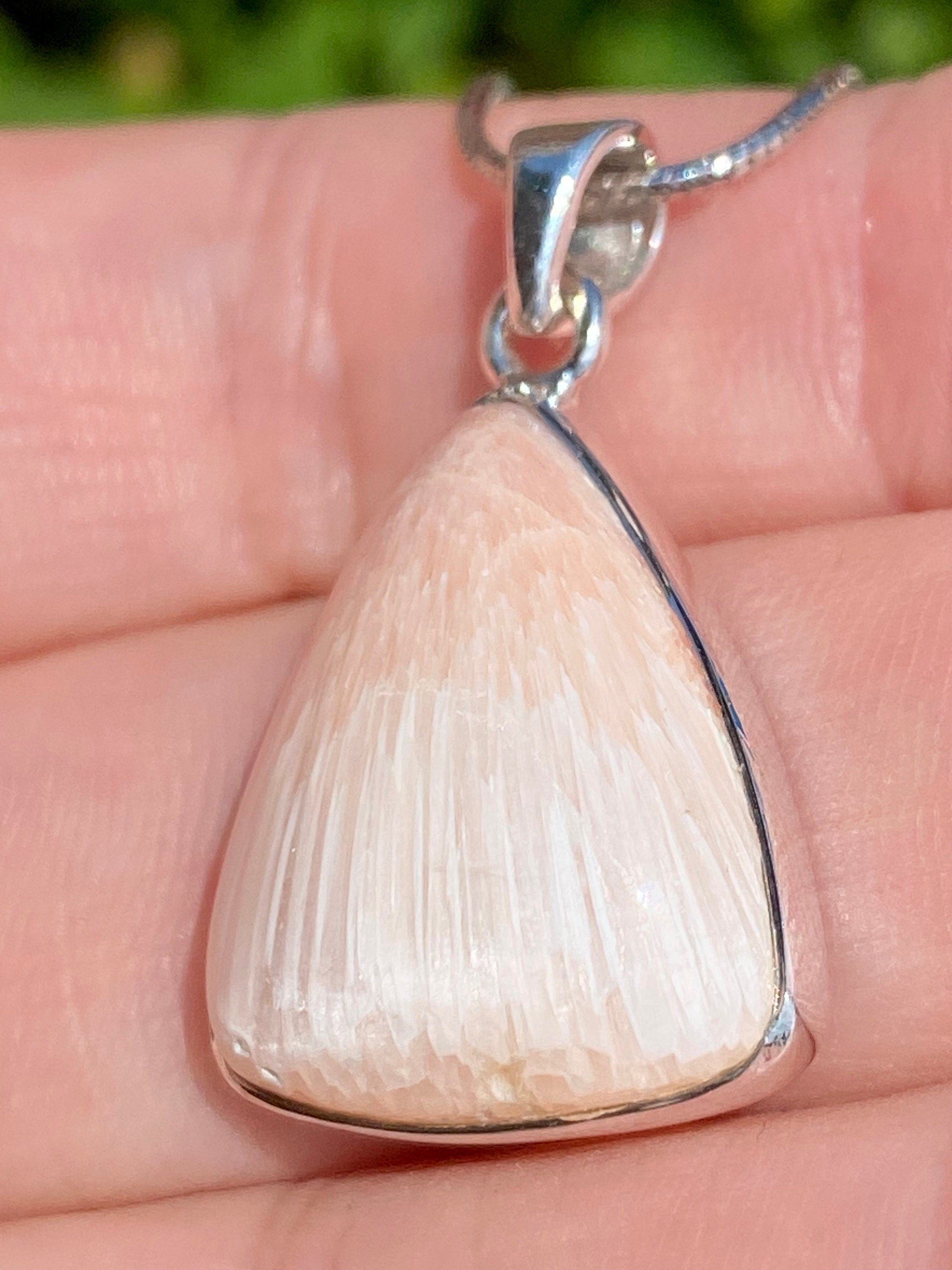 A High Grade Peach Scolecite and Silver Pendant.