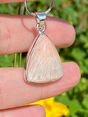 A High Grade Peach Scolecite and Silver Pendant.