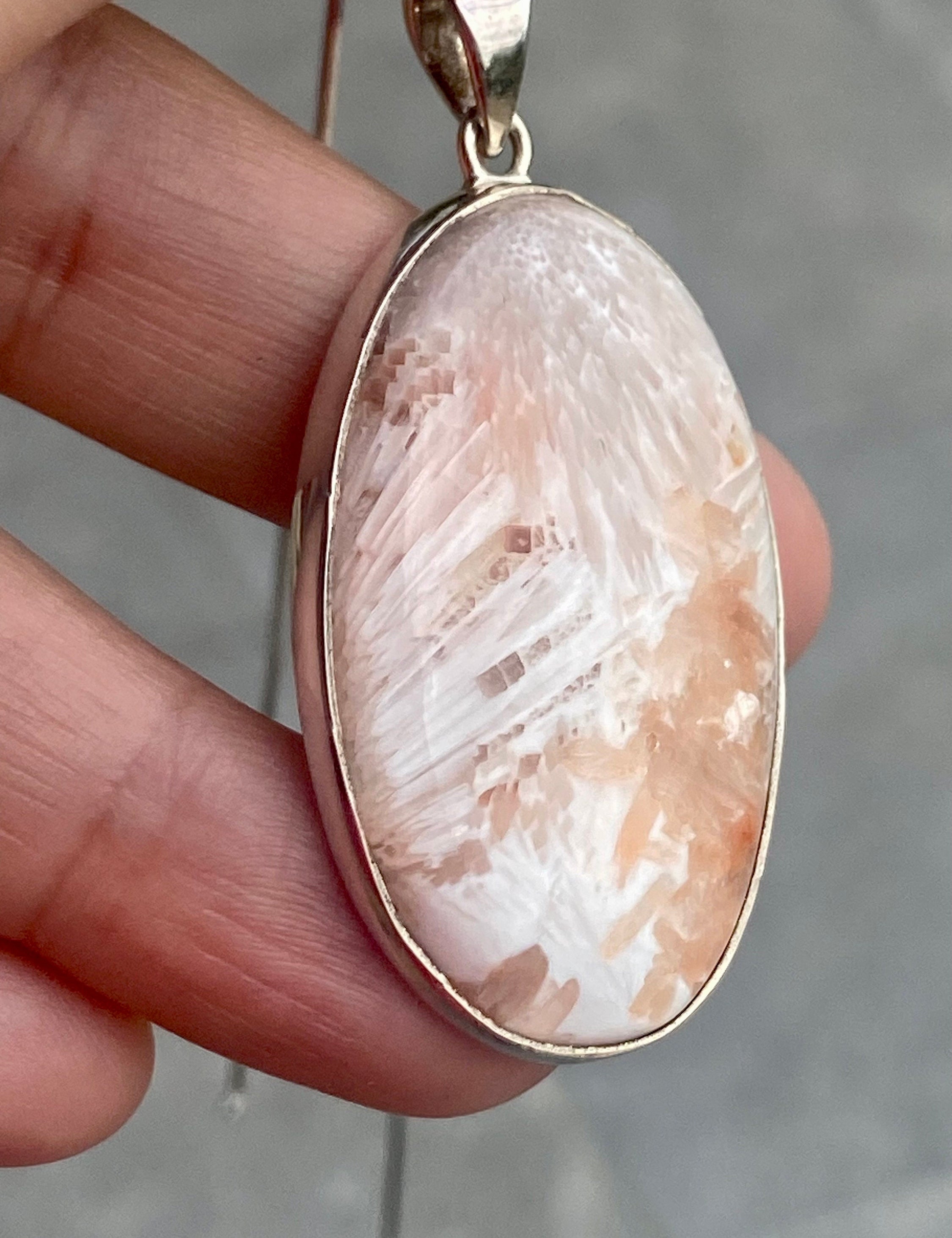 A High Grade Peach Scolecite and Silver Pendant.