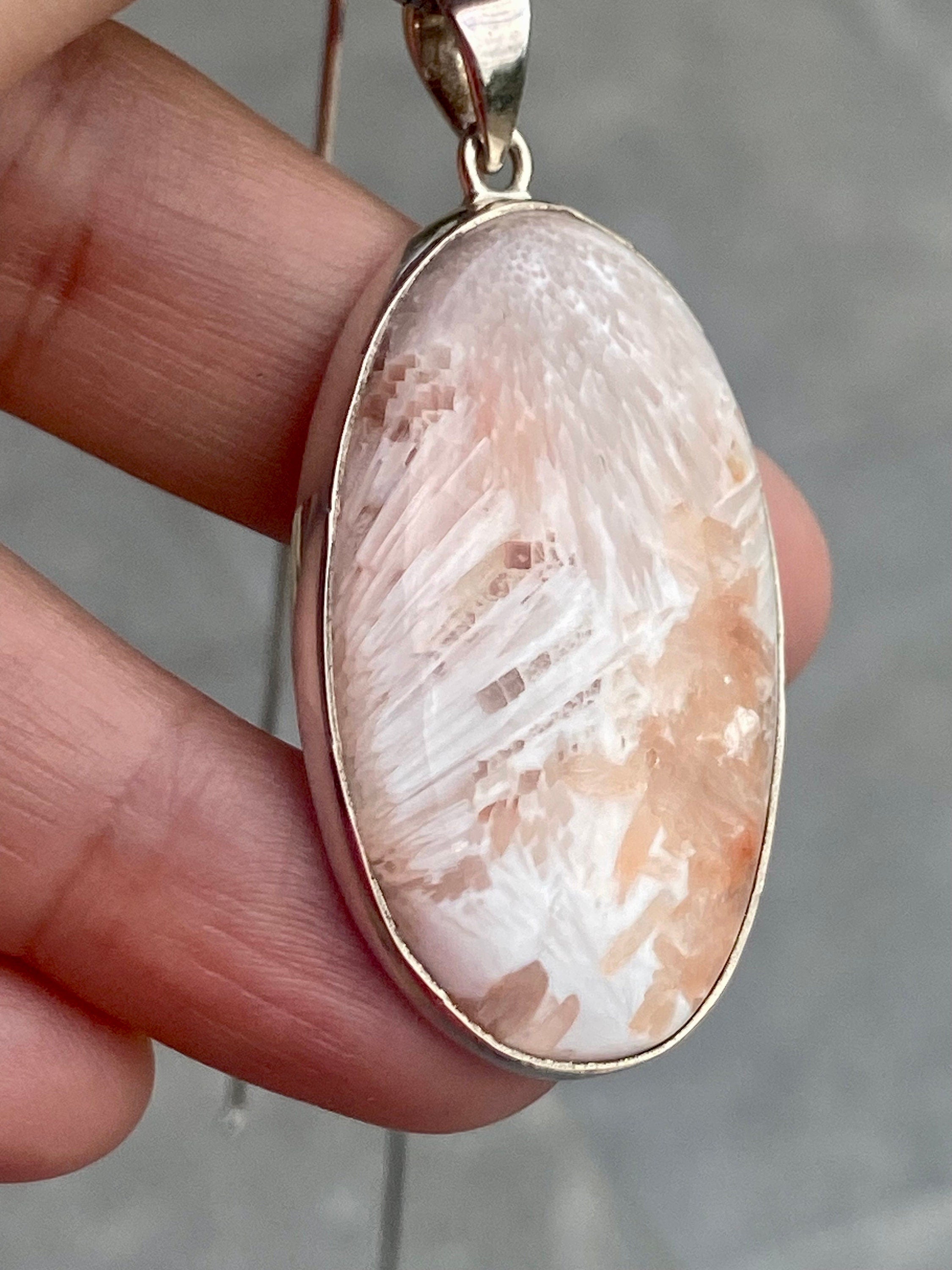 A High Grade Peach Scolecite and Silver Pendant.