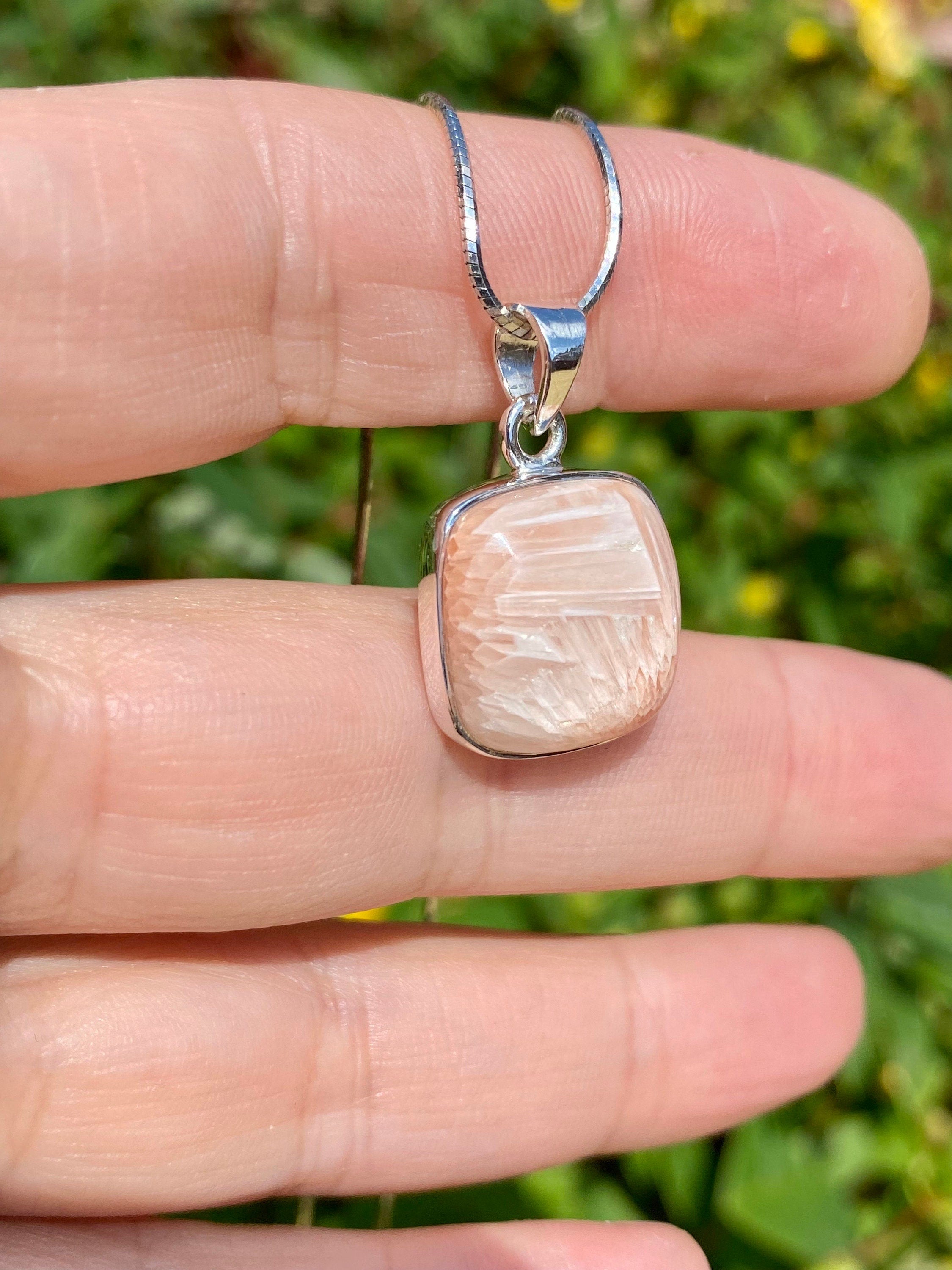 A High Grade Peach Scolecite and Silver Pendant.