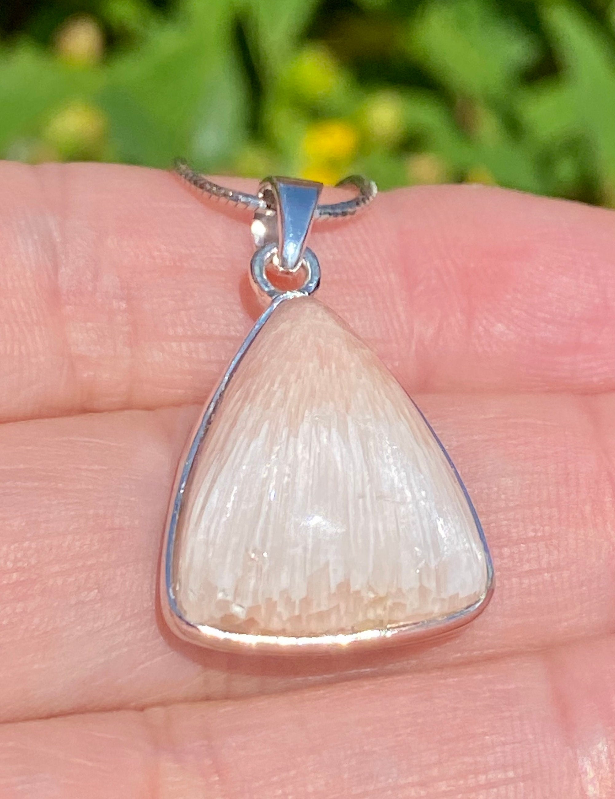 A High Grade Peach Scolecite and Silver Pendant.