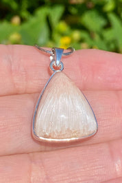 A High Grade Peach Scolecite and Silver Pendant.