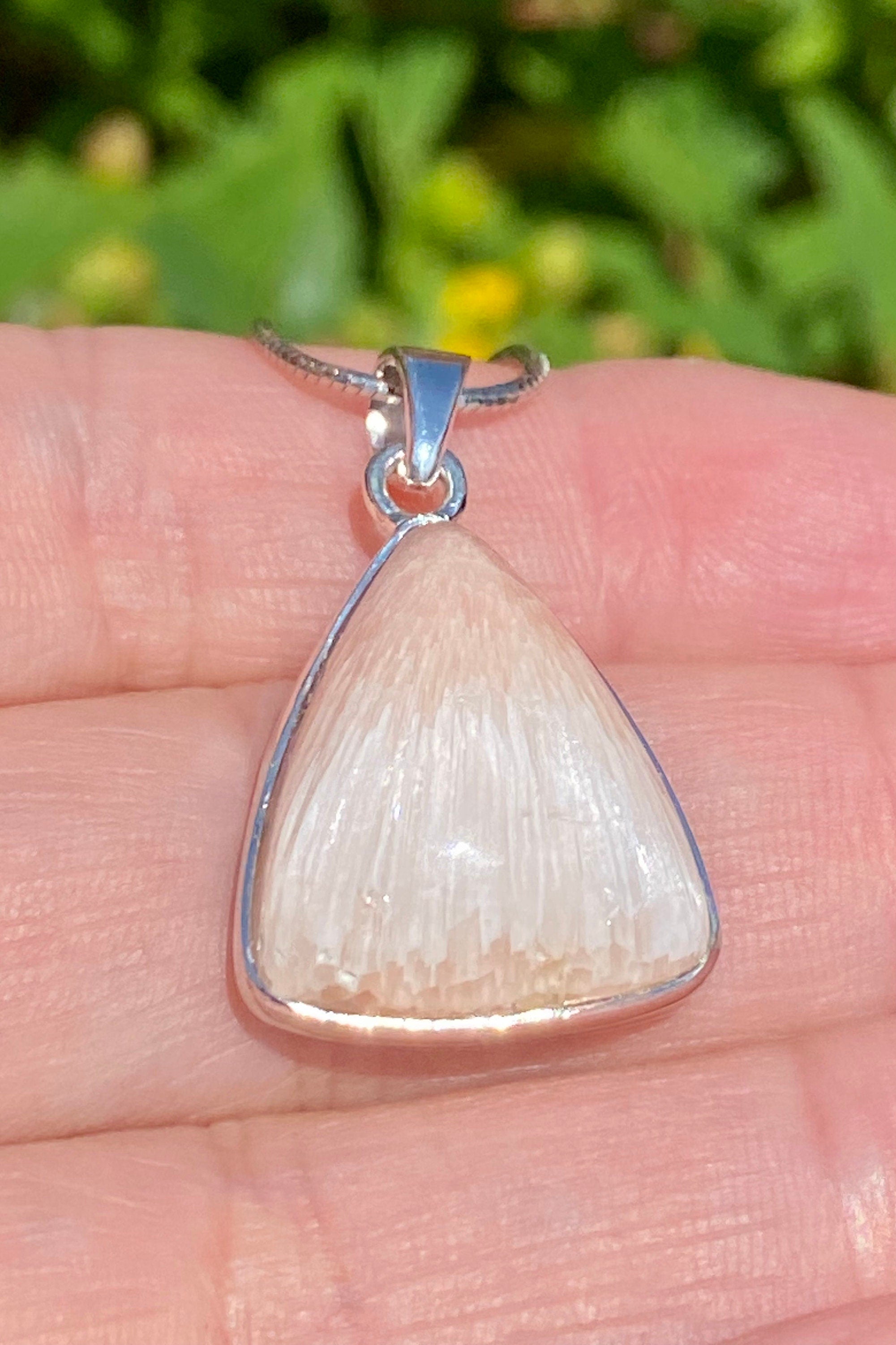 A High Grade Peach Scolecite and Silver Pendant.