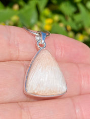 A High Grade Peach Scolecite and Silver Pendant.