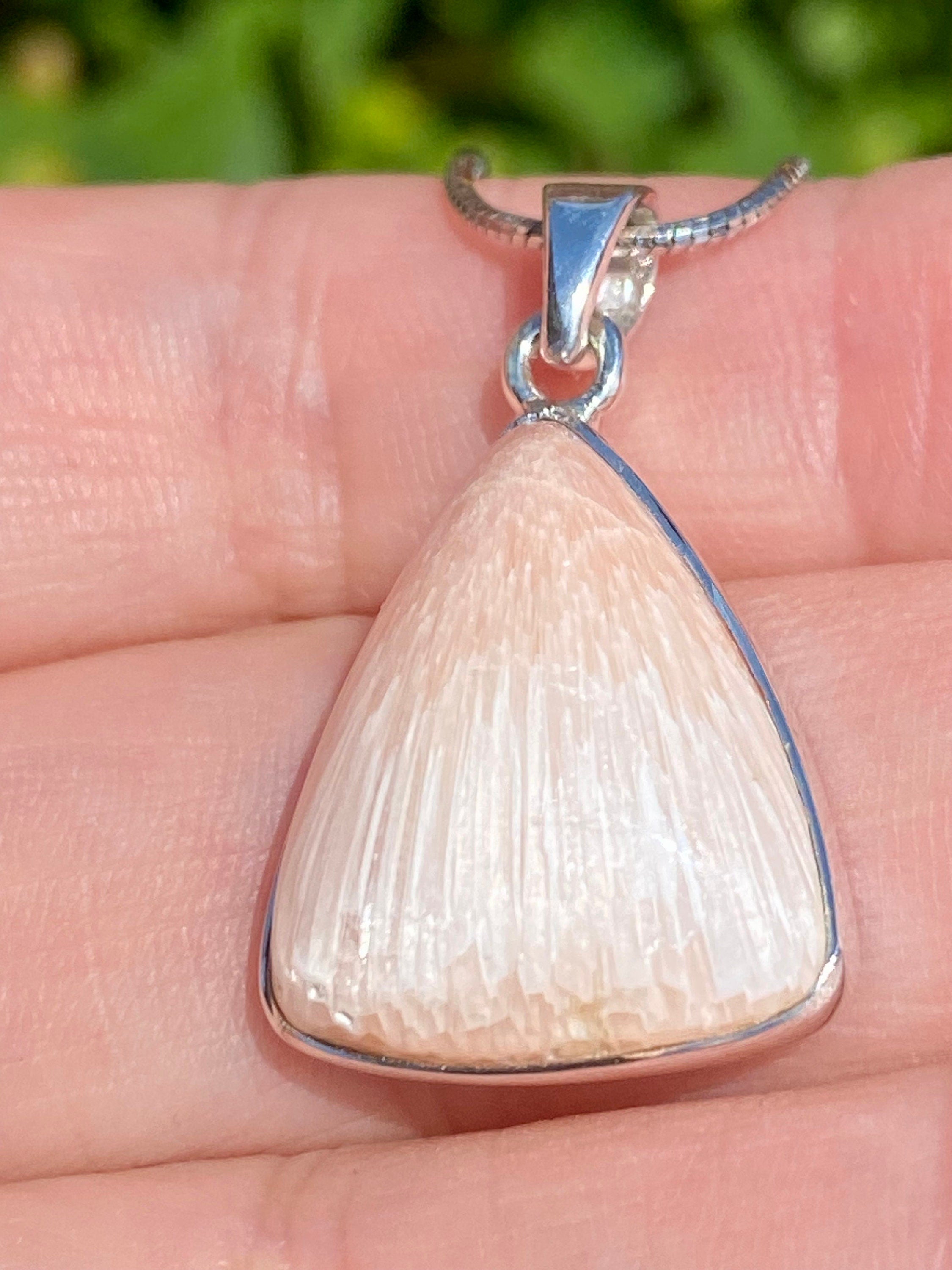 A High Grade Peach Scolecite and Silver Pendant.