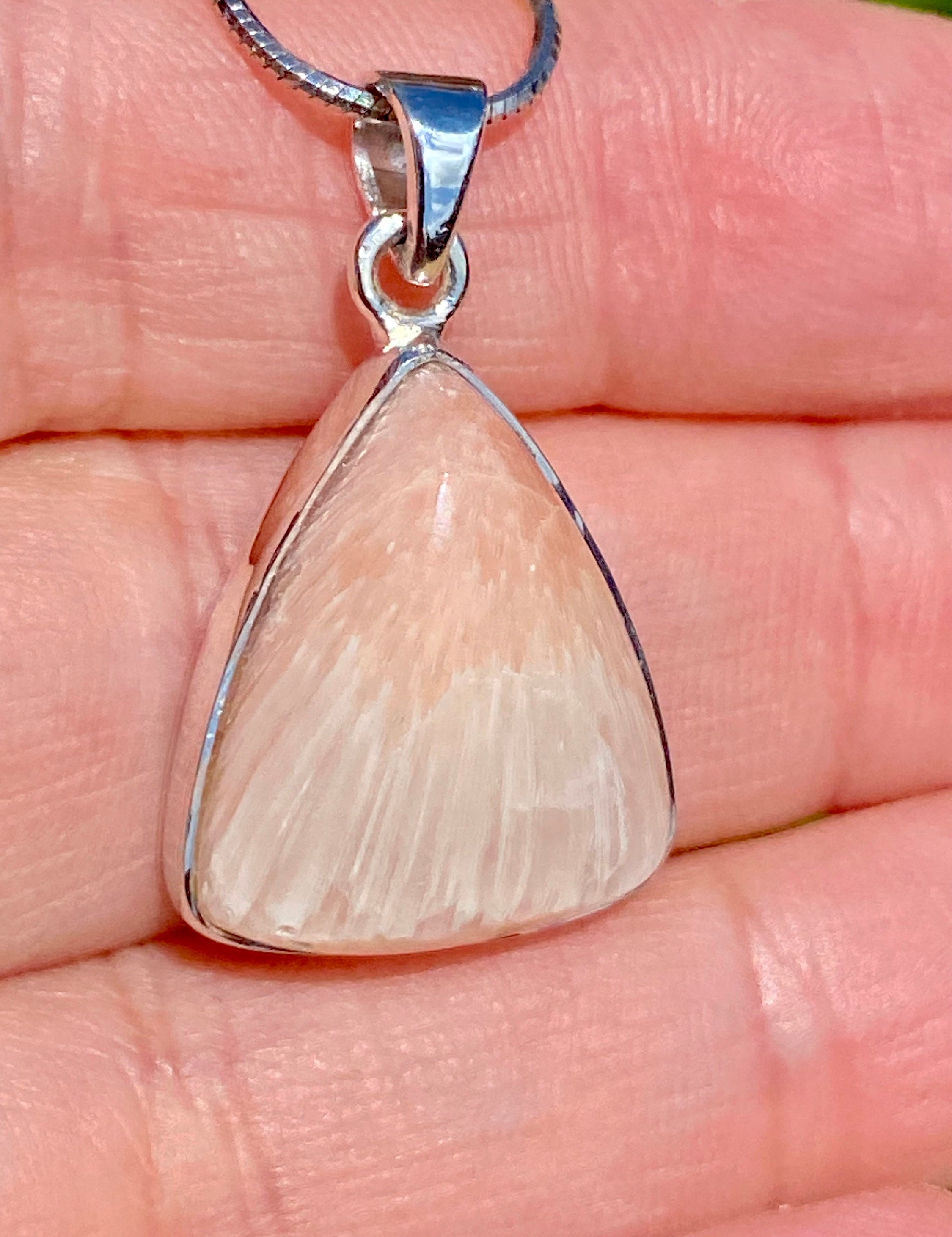 A High Grade Peach Scolecite and Silver Pendant.