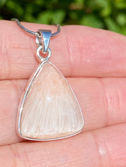 A High Grade Peach Scolecite and Silver Pendant.