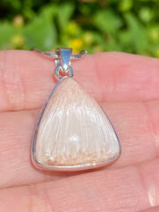 A High Grade Peach Scolecite and Silver Pendant.