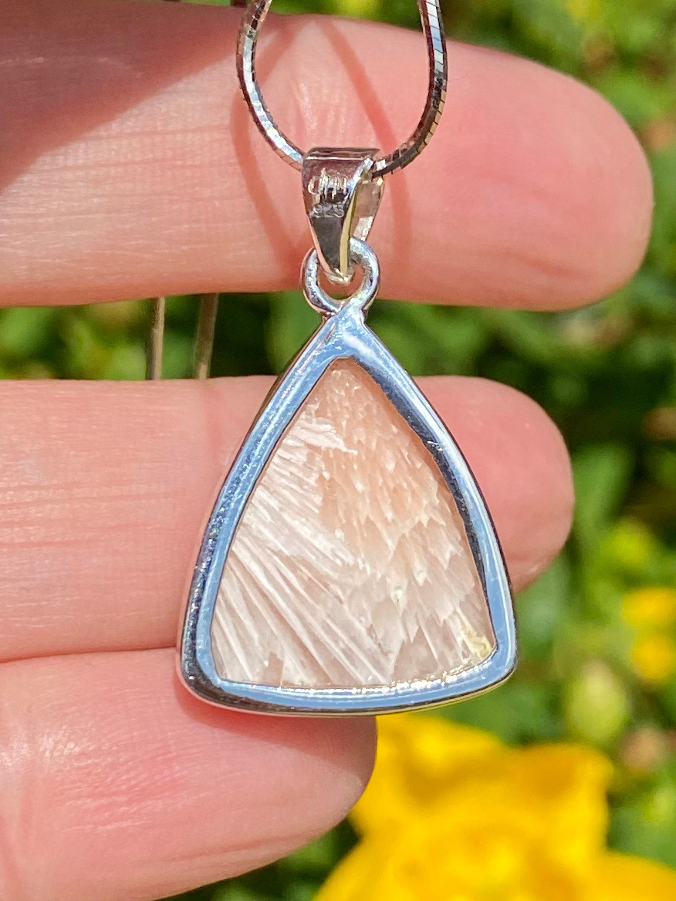 A High Grade Peach Scolecite and Silver Pendant.