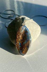 A Natural Australian Boulder Opal and Silver Pendant