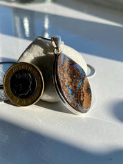 A Natural Australian Boulder Opal and Silver Pendant