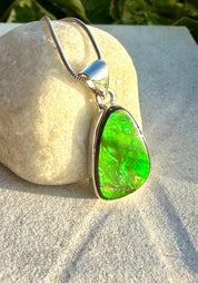 Iridescent Ammolite Pendant: Sterling Silver Pear-Cut Gemstone