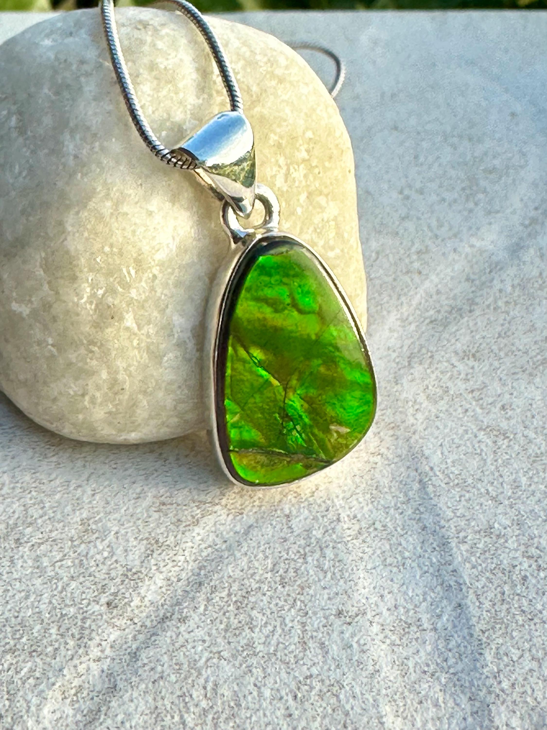 Iridescent Ammolite Pendant: Sterling Silver Pear-Cut Gemstone