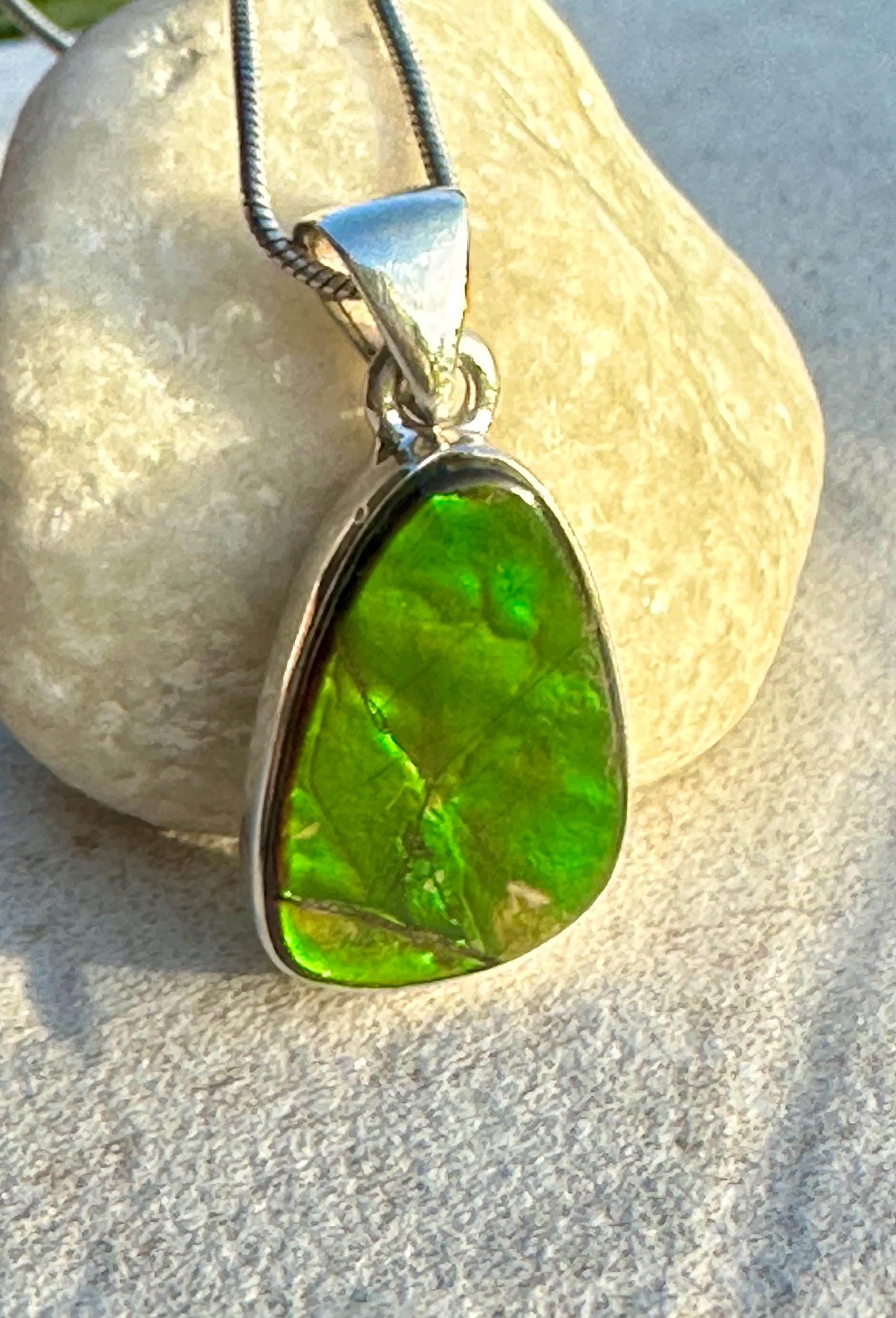 Iridescent Ammolite Pendant: Sterling Silver Pear-Cut Gemstone