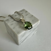 Certified Natural Moldavite 0.60ct Round • 925 Silver Pendant (4-Prong) • Copy of Lab Report Included