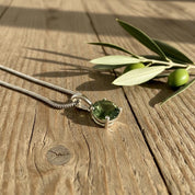 Certified Natural Moldavite 0.60ct Round • 925 Silver Pendant (4-Prong) • Copy of Lab Report Included