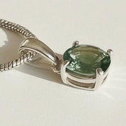 Certified Natural Moldavite 0.60ct Round • 925 Silver Pendant (4-Prong) • Copy of Lab Report Included