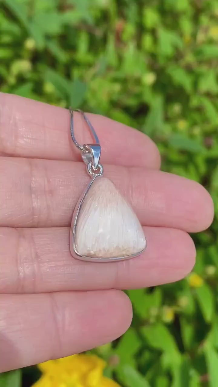 A High Grade Peach Scolecite and Silver Pendant.