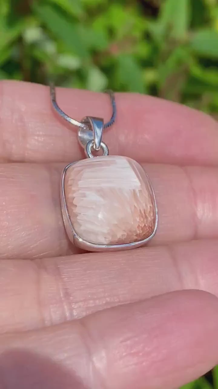 A High Grade Peach Scolecite and Silver Pendant.