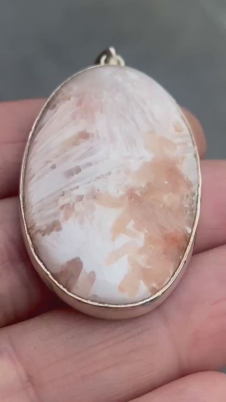 A High Grade Peach Scolecite and Silver Pendant.